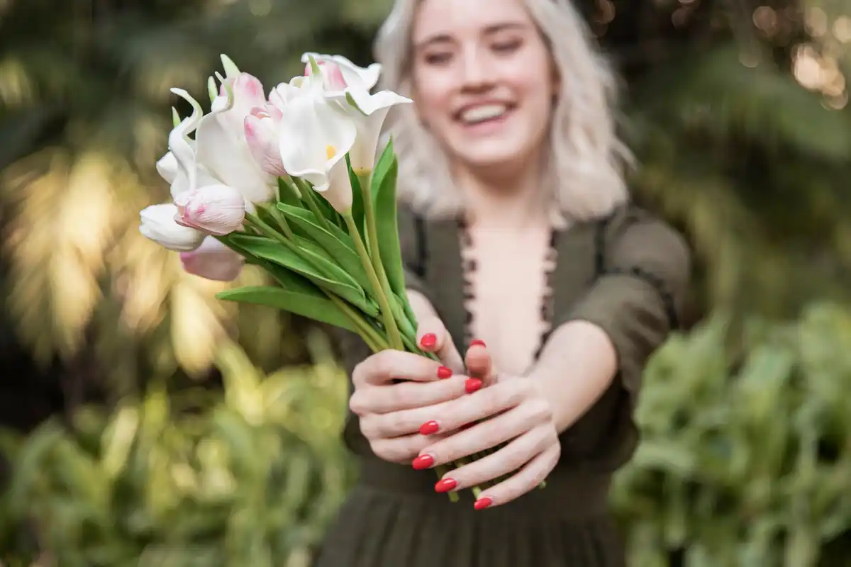 grandma hands in garden flowers