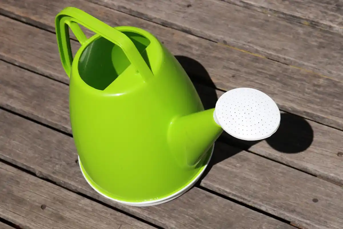 upcycled watering can garden decor