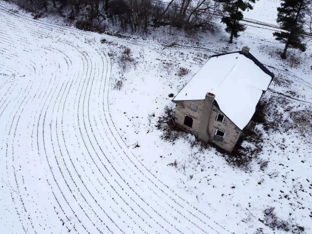 neglected winter garden soil frost Czech village
