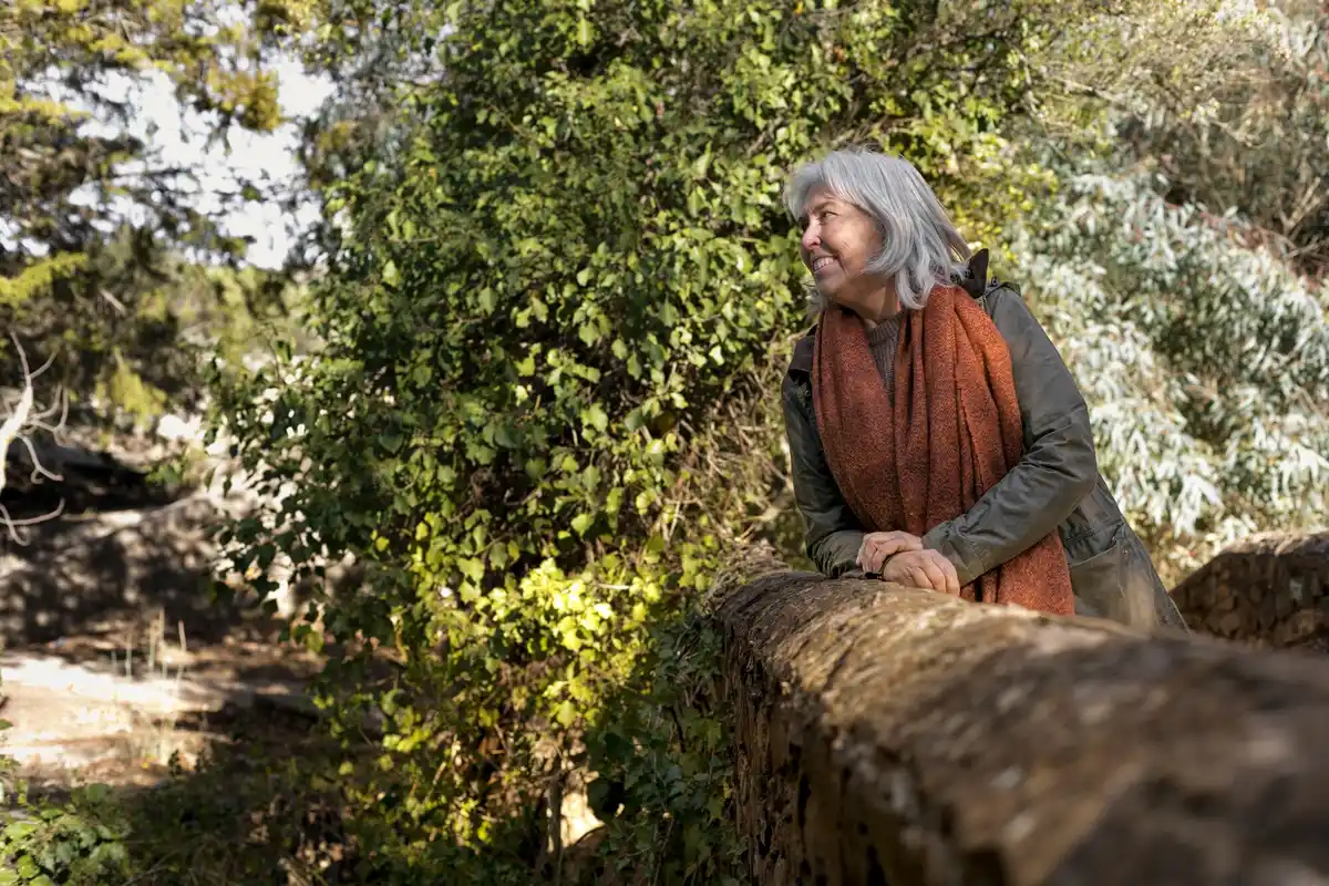 grandmother working in traditional Czech garden