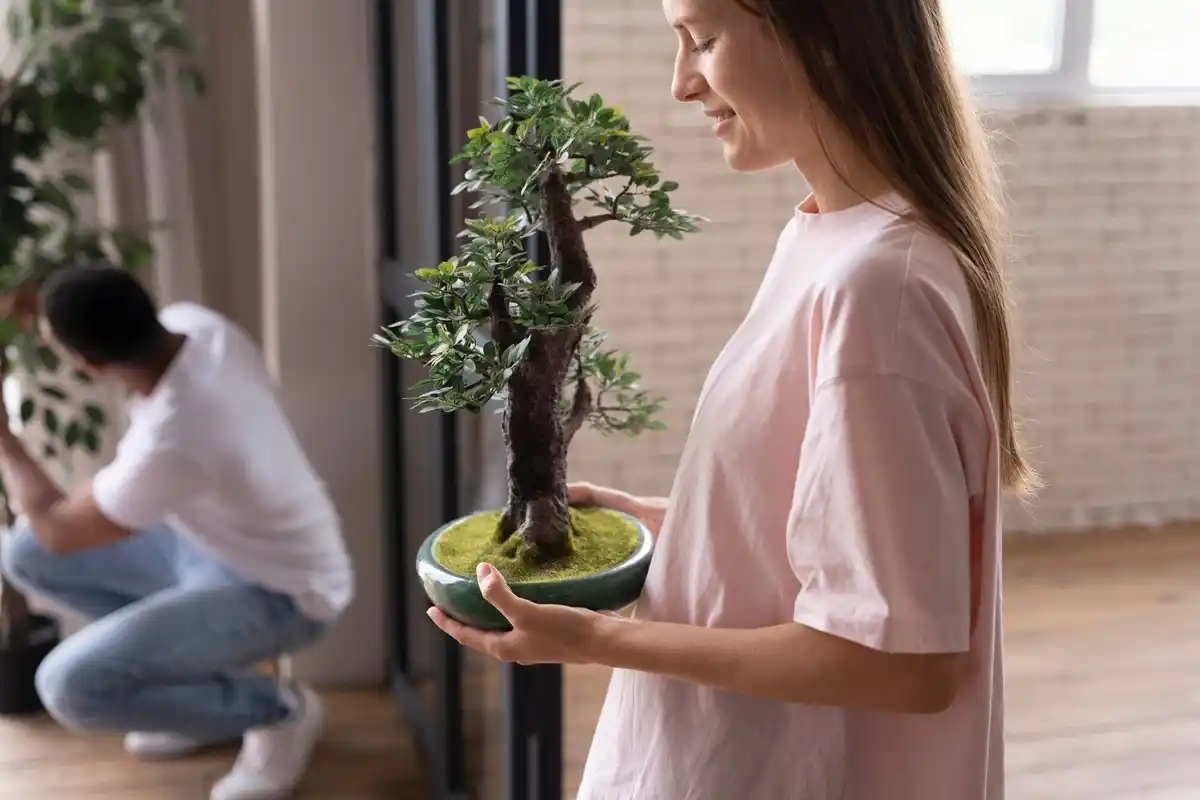 children looking at houseplants home danger