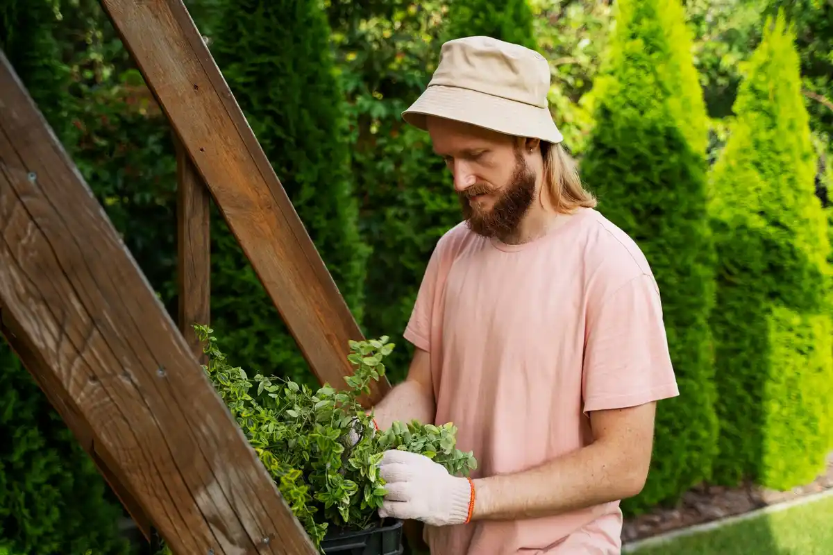 czech gardener checking soil moisture hands