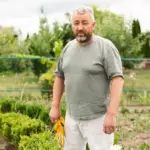 senior czech gardener traditional garden vegetables