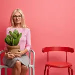 elderly woman happy with indoor plants cozy home Czech style