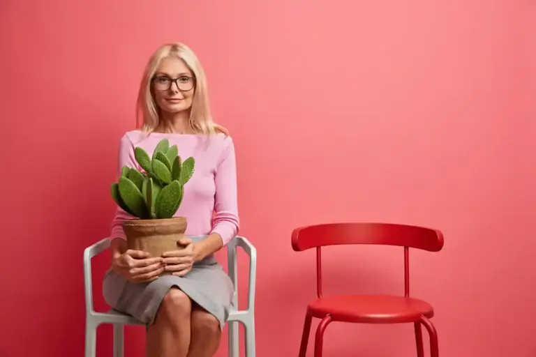 elderly woman happy with indoor plants cozy home Czech style