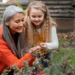 active seniors gardening in czech backyard