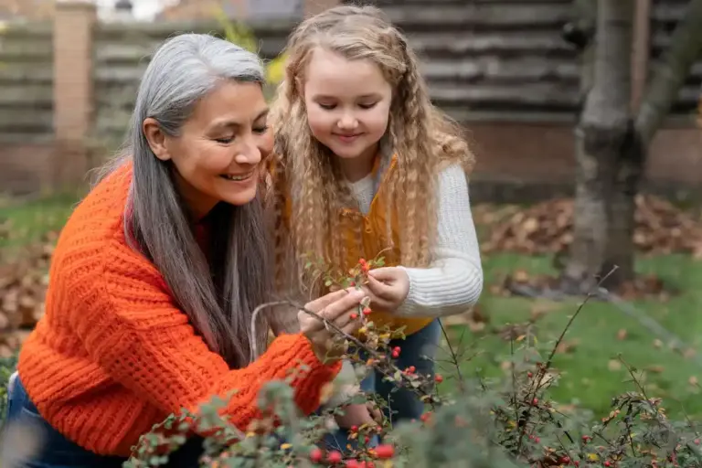 active seniors gardening in czech backyard