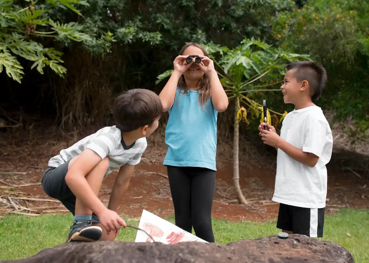 child touching oleander leaves garden warning