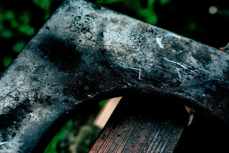 rusty dirty garden tools neglected Czech backyard close up