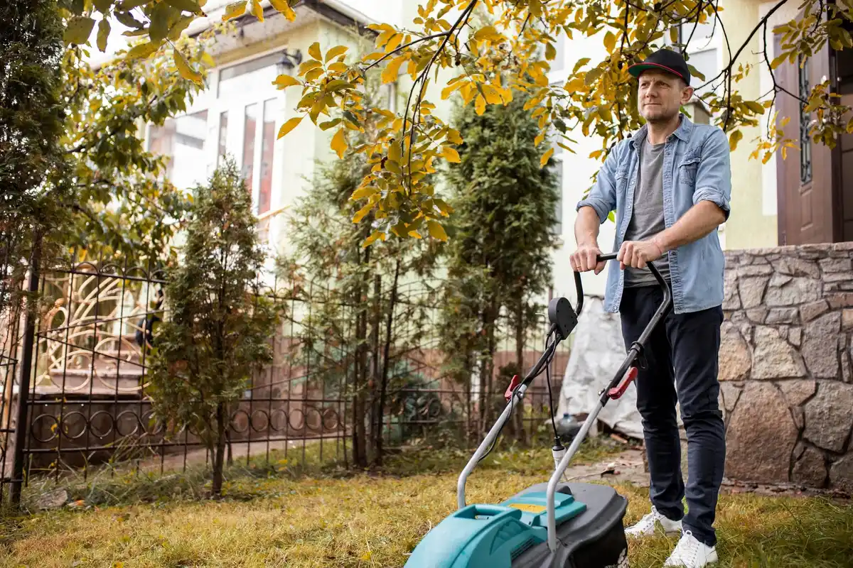 modern battery garden mulcher in czech backyard