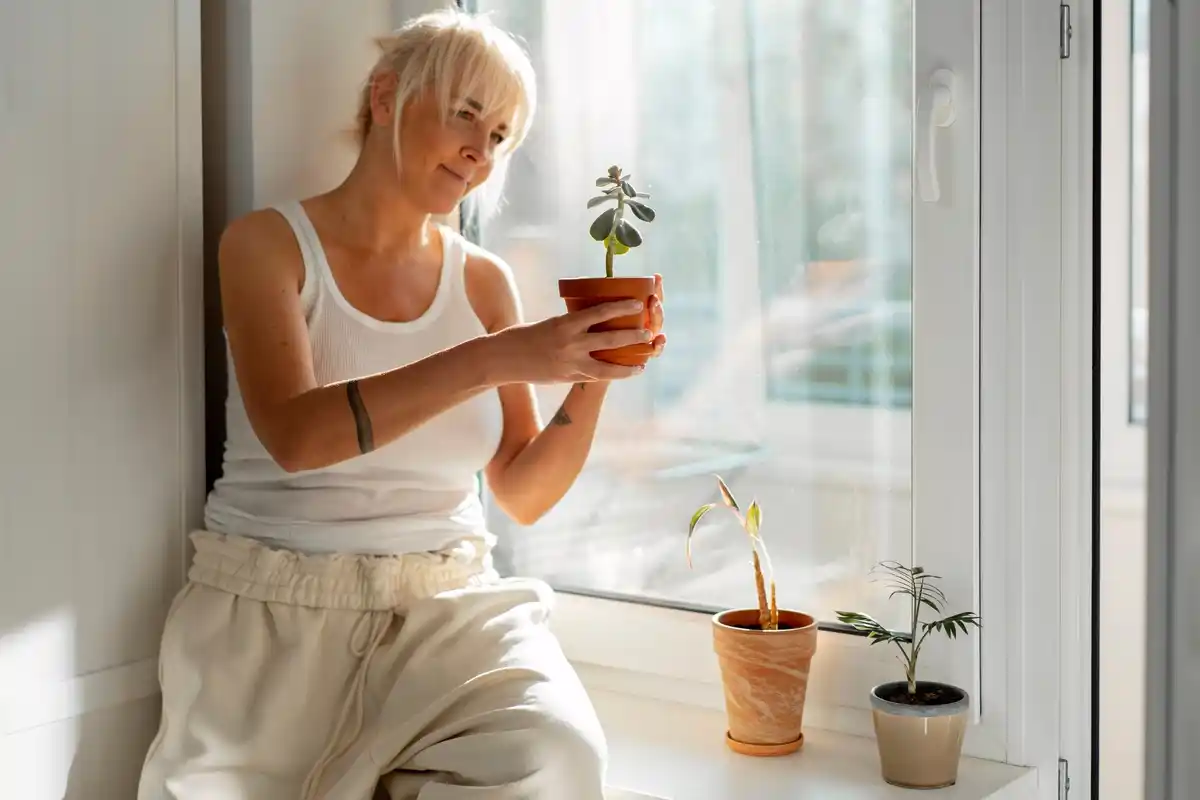 czech senior caring indoor plants cozy old home