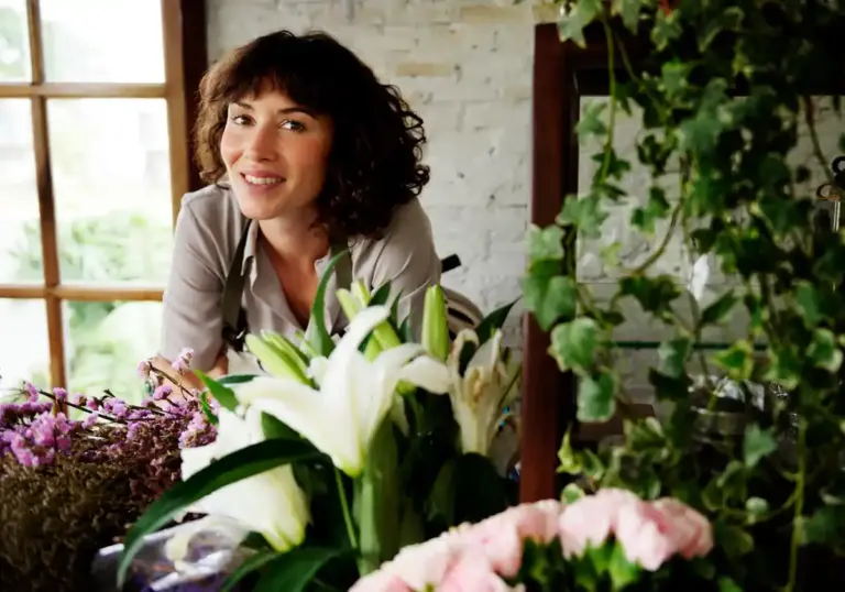women over 50 in modern Czech home with indoor live flowers