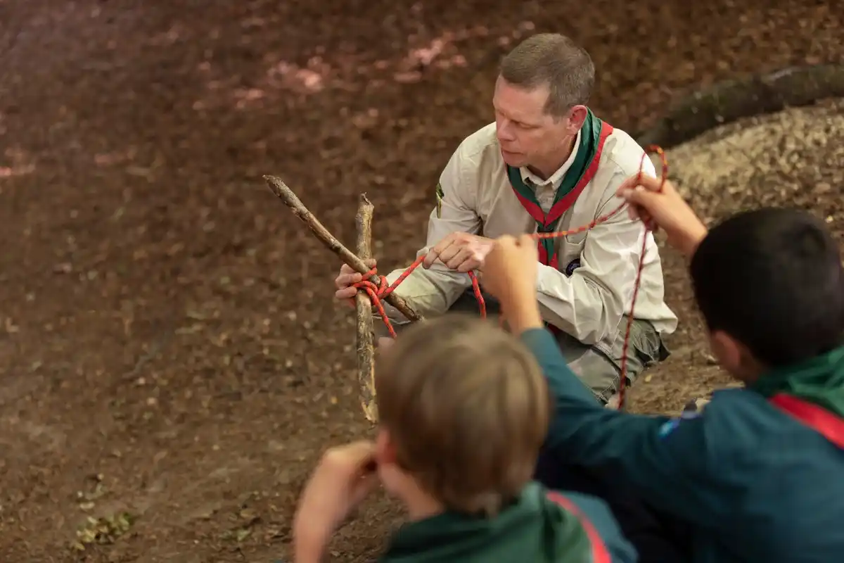 gardener checking earthworms in czech garden soil