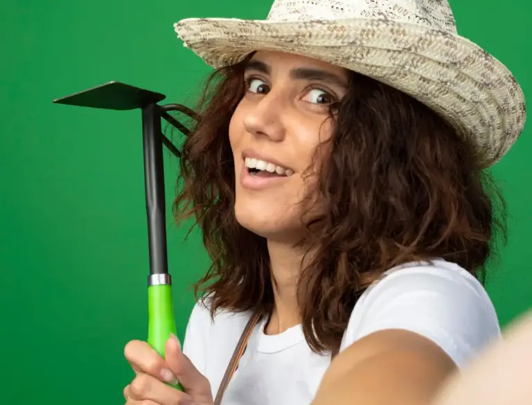 gardener using kitchen fork tool outdoor czech