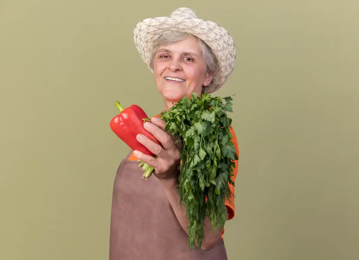 czech granny harvesting organic vegetables garden
